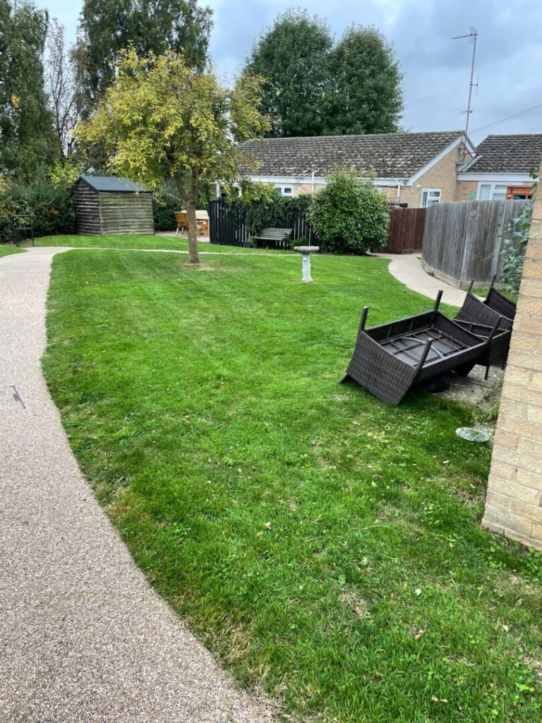 outside bungalow grass mowing