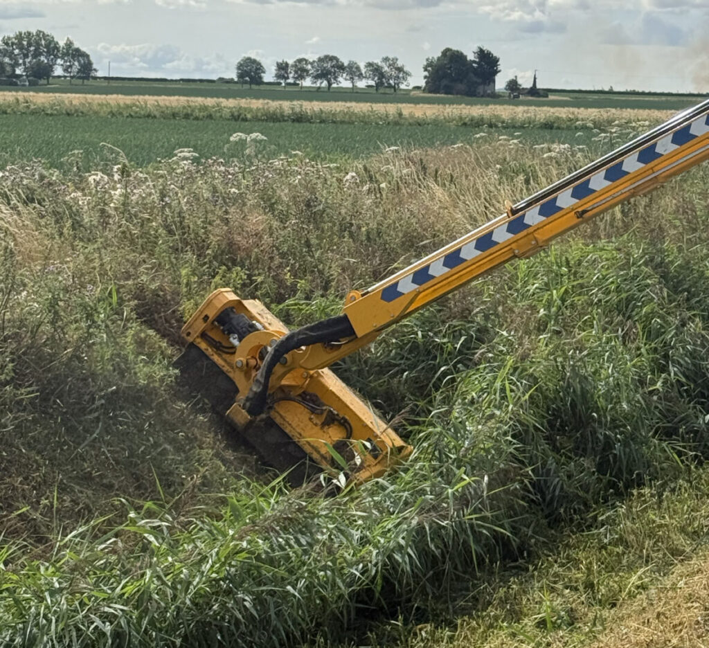 tractor clearing bushes