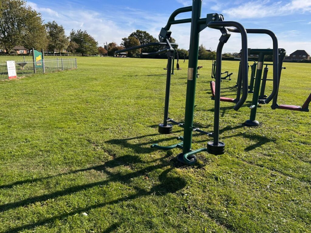 grass mowing on park equipement