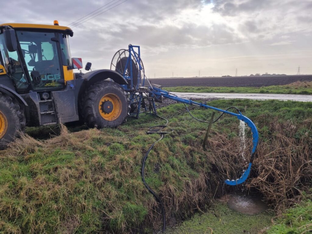 drain jetting in progress near road