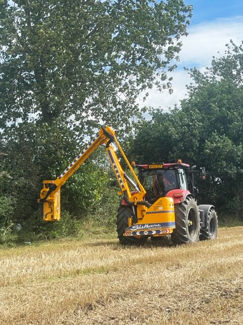 tractor hedge cutting by glover