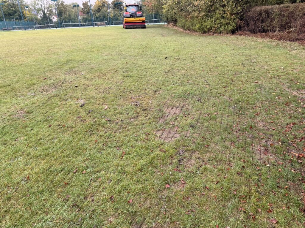 large field overseeding service with tractor