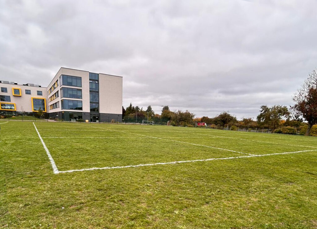 sports field pitch lining marking outside schoool on sports field
