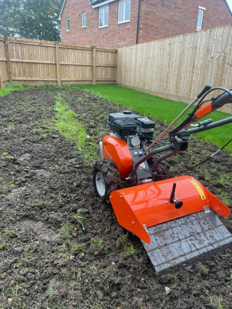 domestic turfing in process at back of house in garden