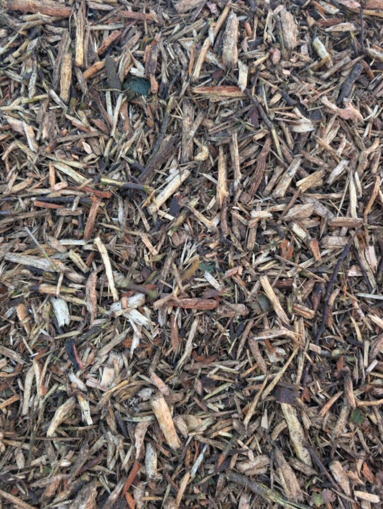 wood chipping pile