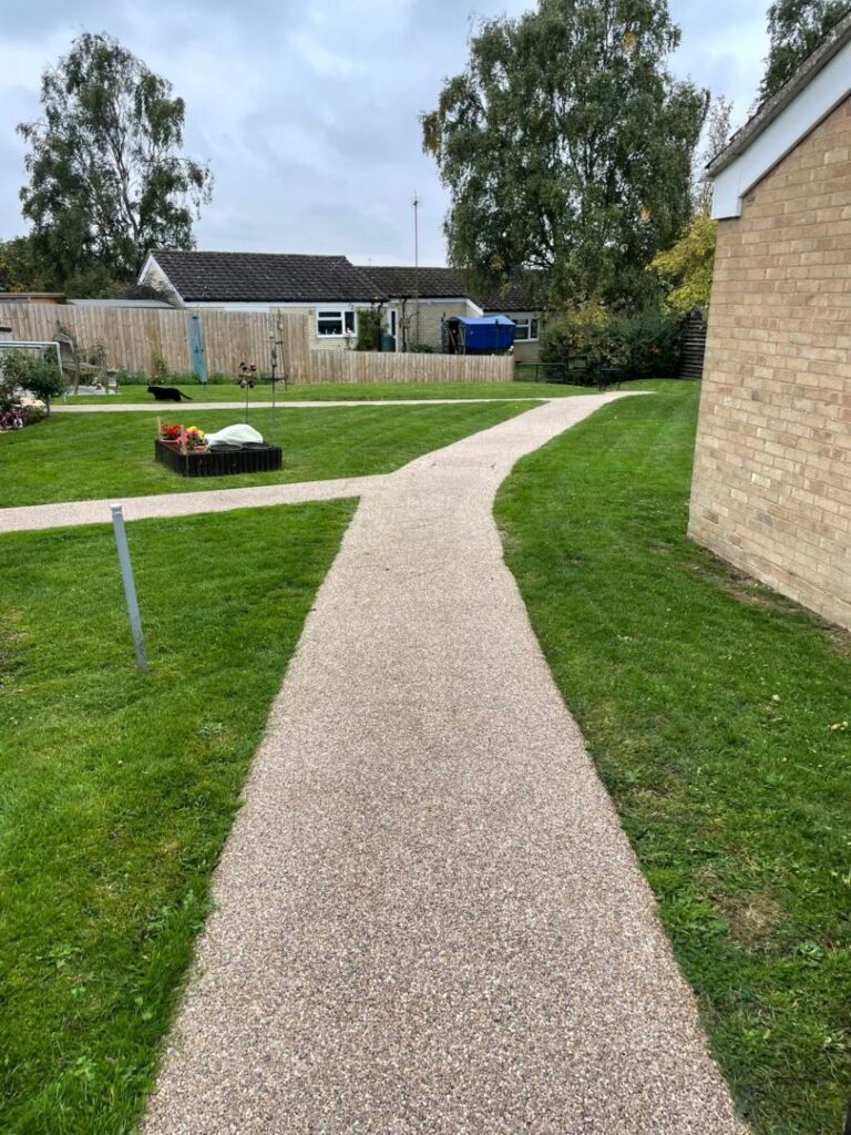clean grass cutting next to path